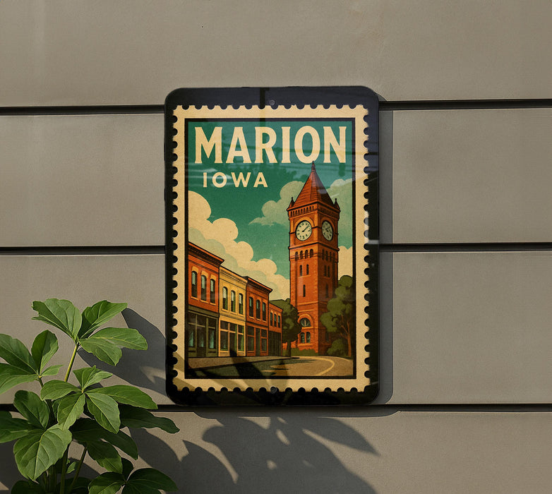 A vintage-style postage stamp depicting a cityscape with a clock tower, mounted on a wall next to a plant.