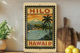 A vintage-style stamp depicting a tropical island landscape with a mountain, palm trees, and a body of water, with the text "HILO" and "HAWAII 8¢" printed on it.