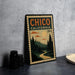 A vintage-style metal stamp with the text "CHICO CALIFORNIA" and a landscape scene depicting a winding road, pine trees, and a sunset.