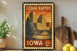 A vintage-style postage stamp from Cedar Rapids, Iowa, featuring a cityscape with a bridge and a sunset sky.