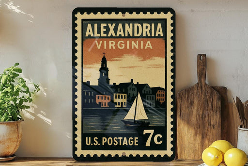 A vintage-style postage stamp from the United States, featuring an illustration of a sailboat on a body of water with a cityscape in the background.