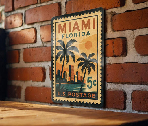 A vintage-style postage stamp from the United States, featuring a tropical cityscape with palm trees and a sun in the sky.