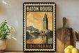 A framed vintage postage stamp depicting the Baton Rouge Bridge in Louisiana, with the text "Baton Rouge" and "Louisiana" printed on it.
