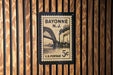 Bayonne New Jersey postage stamp on a wooden wall.