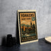 A vintage postage stamp from New York, featuring a cityscape and landmarks, is displayed on a table.
