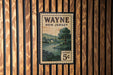 A vintage postage stamp from Wayne, New Jersey, featuring a scenic landscape with a river and trees.
