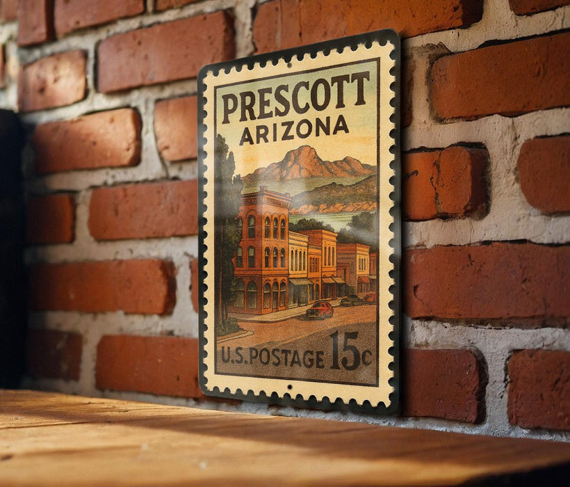 A vintage postage stamp from the United States of America, featuring an illustration of a small town in Arizona with buildings and a mountain in the background.