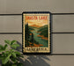 A vintage-style postage stamp depicting Shasta Lake, with a scenic landscape of mountains, forests, and a river.