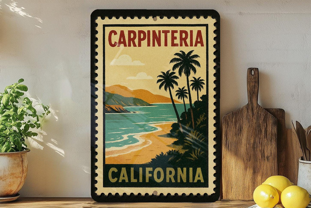 A vintage-style poster of Carpinteria, California, featuring palm trees, a beach, and mountains, is displayed on a wall next to a wooden cutting board and a potted plant.