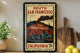 A vintage-style poster advertising South San Francisco, California, with a depiction of industrial buildings and smoke stacks.