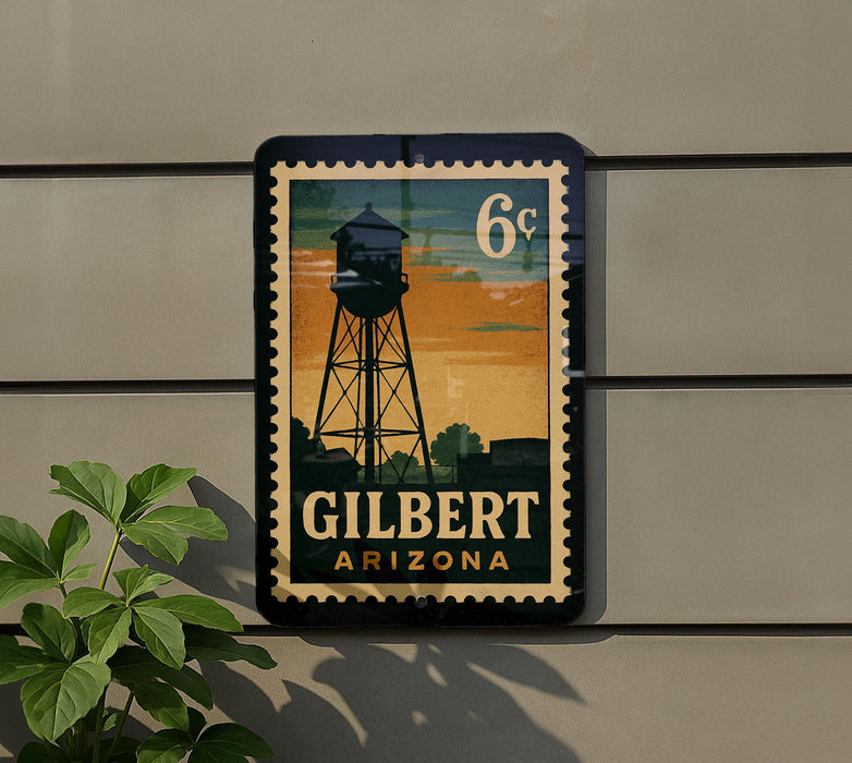 A vintage-style sign for Gilbert, Arizona, featuring a water tower silhouette and the text "6c" in the top right corner.