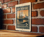 A vintage postage stamp from New Bedford, Massachusetts, featuring a sailing ship on a brick wall.
