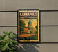 A framed poster of the Kannapolis North Carolina landmark, featuring a building with a dome and columns, is displayed on a wall.