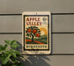 A vintage-style postage stamp from Minnesota, featuring an illustration of an apple tree and the text "Apple Valley 6c U.S. POSTAGE MINNESOTA".
