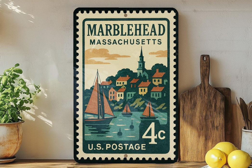 A vintage-style postage stamp from Marblehead, Massachusetts, featuring a colorful illustration of a town with sailboats on the water.