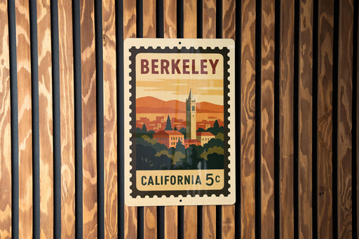 A vintage postage stamp from California, featuring a cityscape and a tower, is displayed on a wooden wall.