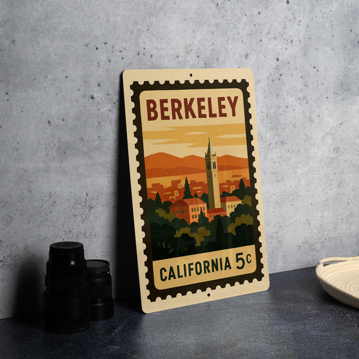 A vintage postage stamp depicting the city of Berkeley, California, with a tower and a sunset in the background.