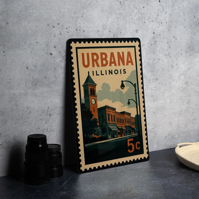 A vintage postage stamp from Illinois, featuring an illustration of a town with a clock tower, is displayed on a table.