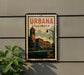 A vintage postage stamp from Illinois, featuring a building with a clock tower, is displayed on a wall.