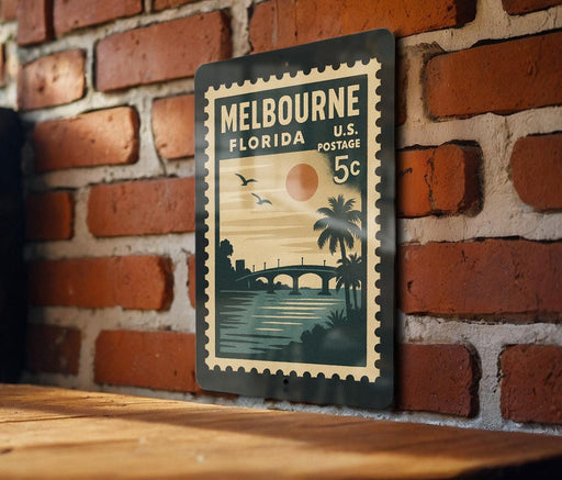 A vintage postage stamp from Melbourne, Florida, featuring a tropical landscape with palm trees, a bridge, and a sunset.