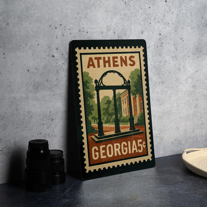 A framed poster of the University of Georgia's historic arch, located in Athens, Georgia.
