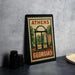 A framed poster of the University of Georgia's historic arch, located in Athens, Georgia.