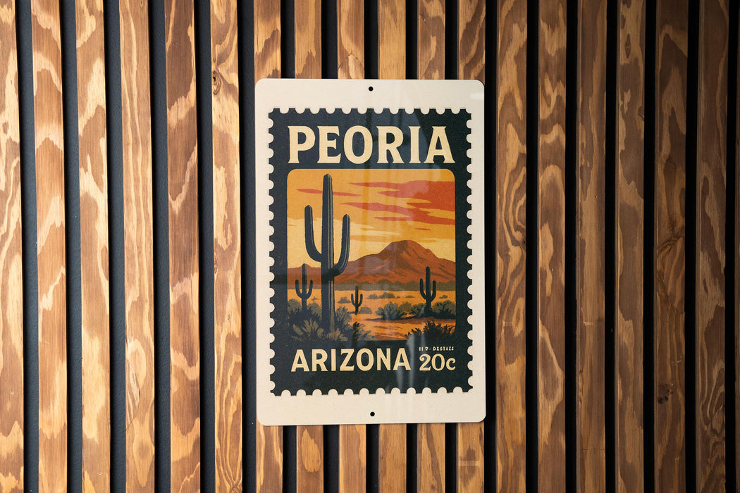 A vintage-style postage stamp from Arizona, featuring a desert landscape with cacti and mountains, is displayed on a wooden wall.