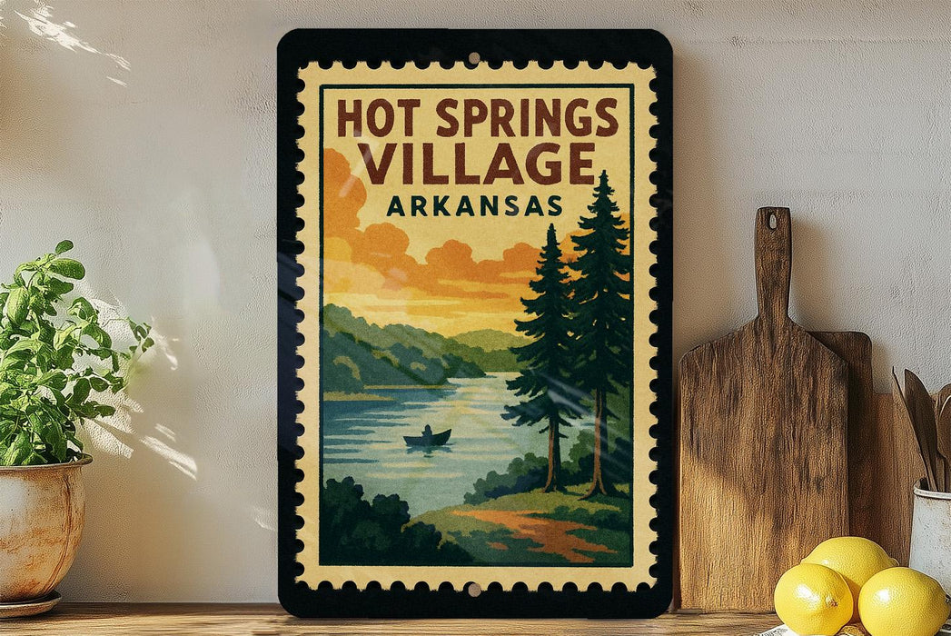 A framed vintage-style poster of Hot Springs Village, Arkansas, featuring a scenic landscape with pine trees, a lake, and a boat.