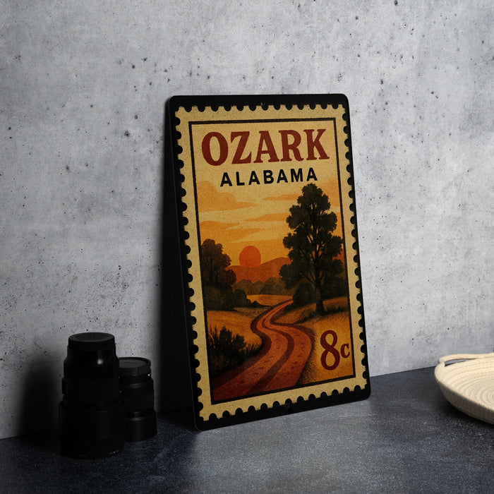 A framed postcard with a scenic landscape of a winding road and trees, featuring the text "OZARK ALABAMA" and "8c".