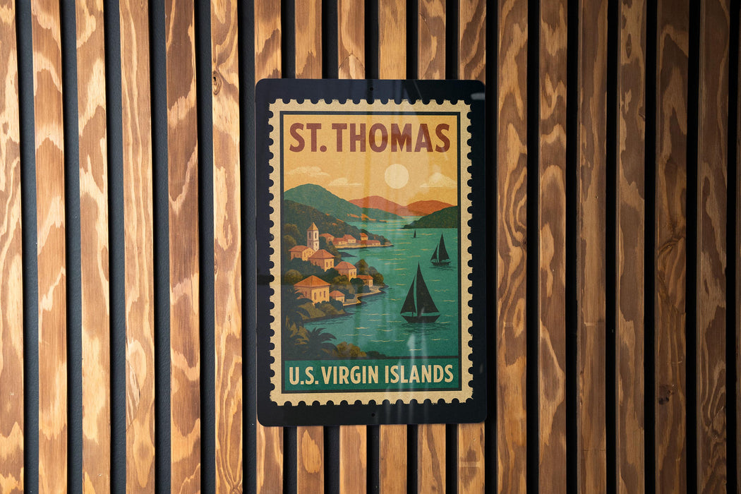 A vintage postage stamp depicting St. Thomas, the Virgin Islands, with sailboats and a scenic landscape.