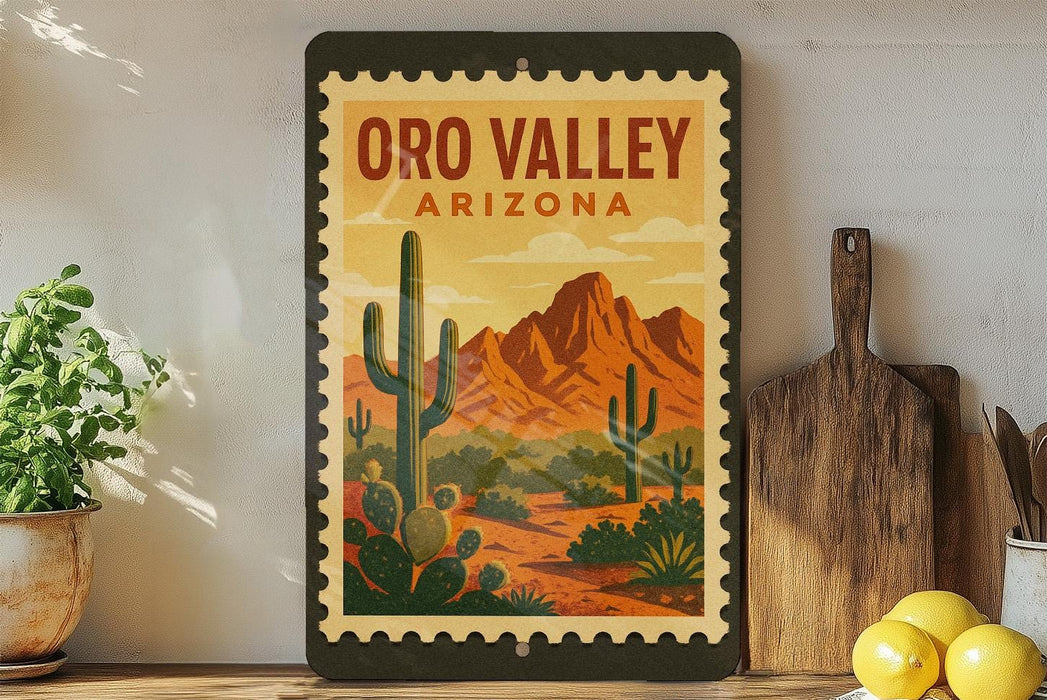 A framed poster of the Oro Valley in Arizona, featuring a desert landscape with cacti and mountains in the background.