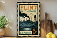 A vintage postage stamp from Flint, Michigan, featuring a cityscape and steam rising from a bridge, with the text "FLINT MICHIGAN 5¢ U.S. POSTAGE".