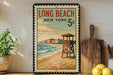 A vintage-style poster of Long Beach, New York, featuring a lifeguard tower and a beach scene, is displayed on a wall next to a wooden cutting board and a potted plant.
