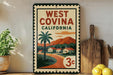A vintage-style metal sign with a tropical landscape and text, placed on a wooden surface next to a wooden cutting board and some lemons.