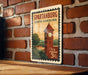 A vintage postage stamp from the United States of America, featuring a red brick wall and a clock tower, with the text "SPARTANBURG SOUTH CAROLINA" and "U.S. POSTAGE 3c".