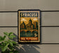 A vintage postage stamp depicting the city of Syracuse, New York, with a bridge and buildings in the background.