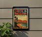 A vintage-style sign for Santa Barbara, California, featuring a beach scene with palm trees and mountains in the background.