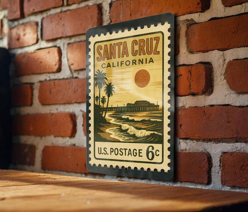A vintage-style postage stamp from the United States, featuring a beach scene with palm trees and a sunset, mounted on a brick wall.