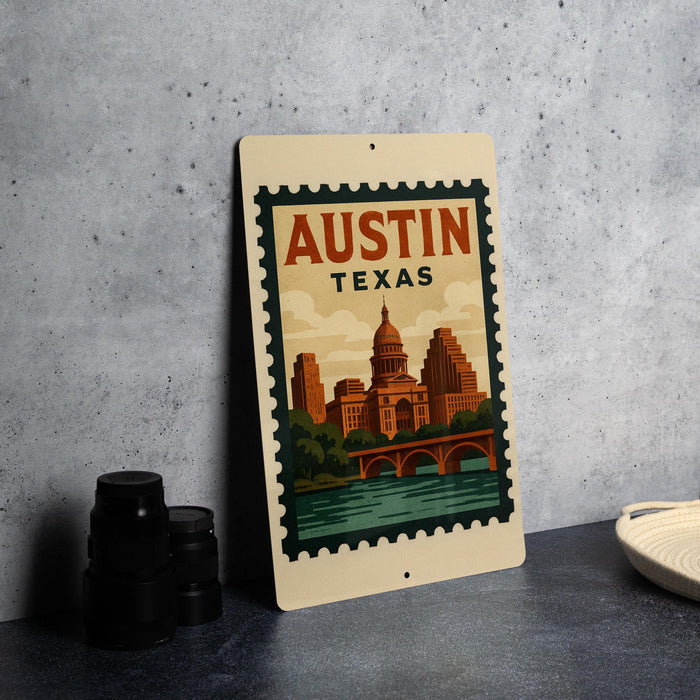 A metal sign with a vintage-style illustration of Austin, Texas, featuring the city's iconic landmarks and a river.