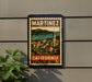 A vintage-style postage stamp depicting a town in California, with mountains in the background and a church steeple visible.