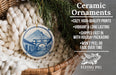 Ceramic ornaments, featuring a blue and white design of a building with a clock tower, are displayed in a basket.