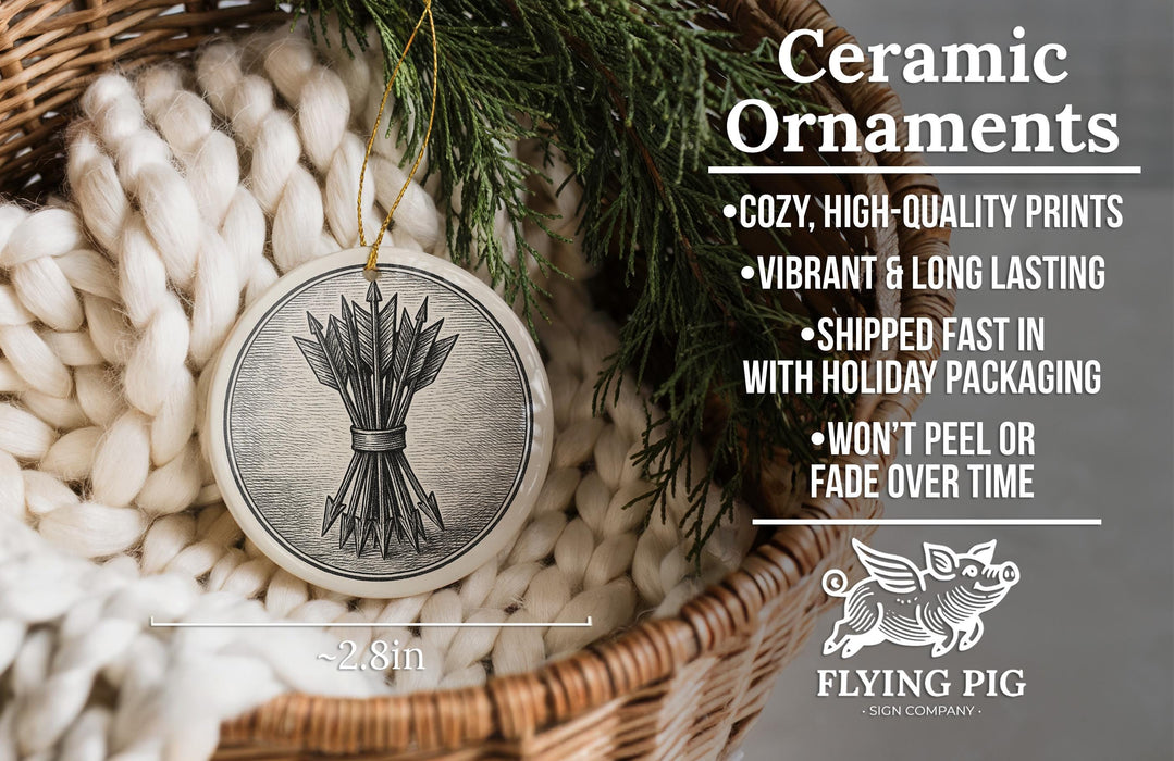 Ceramic ornaments, featuring a ceramic ornament with a design of arrows, are displayed in a woven basket.