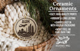 Ceramic ornaments, including a round ornament with a city skyline and a wicker basket filled with greenery.