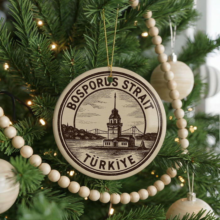 A circular ornament on a Christmas tree, featuring a drawing of the Bosphorus Strait in Istanbul, Turkey.