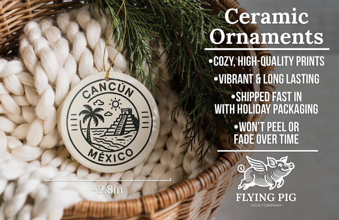 Ceramic ornaments, featuring a design of a Cancun Mexico landmark, are displayed in a woven basket.