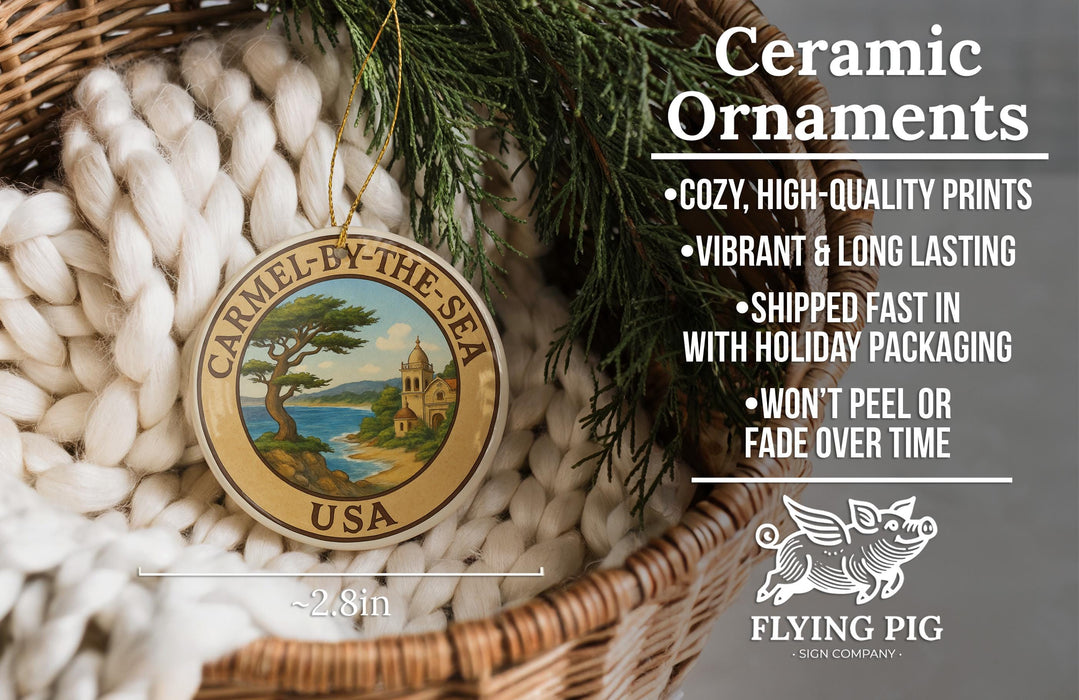 Ceramic ornaments, featuring a ceramic ornament with a tree design and text, placed in a woven basket with greenery.