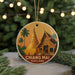 A round ornament featuring a temple and palm trees, with the text "CHIANG MAI THAILAND" printed on it.