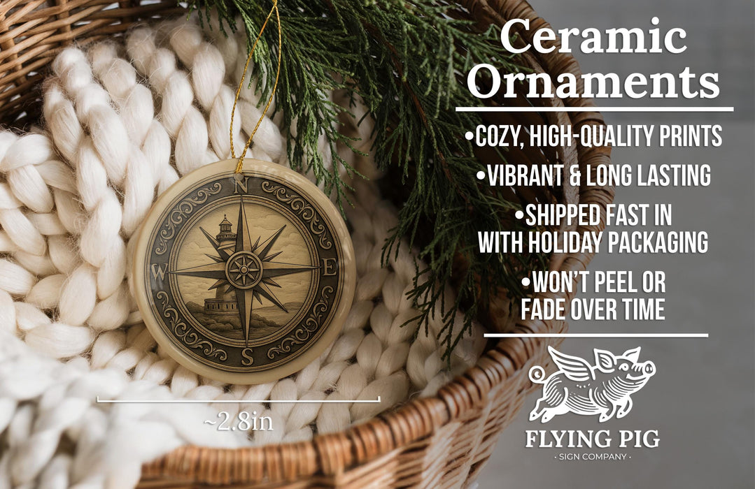 Ceramic ornaments, a compass, and a pine branch are displayed in a woven basket.