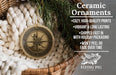 Ceramic ornaments, a compass, and a pine branch are displayed in a woven basket.