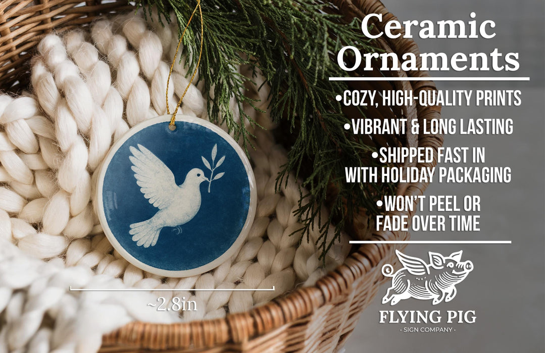 Ceramic ornaments, featuring a blue and white design with a white bird and leaf, are displayed in a woven basket.
